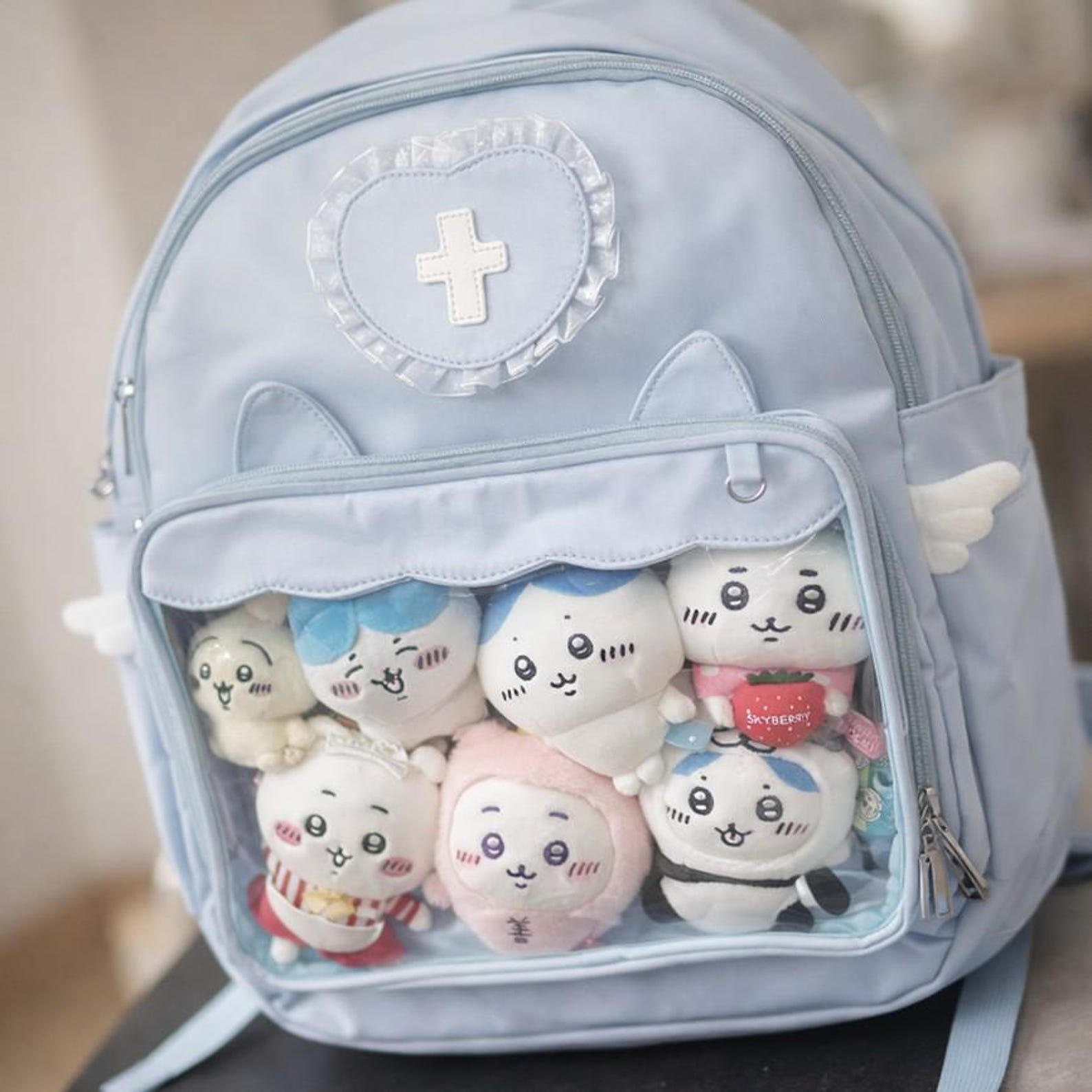 Angel Nurse Ita Backpack with Clear Display Window | Kawaii Plush Decor Anime Cosplay Bag | Medical-Themed Pin Bag for Collectors
